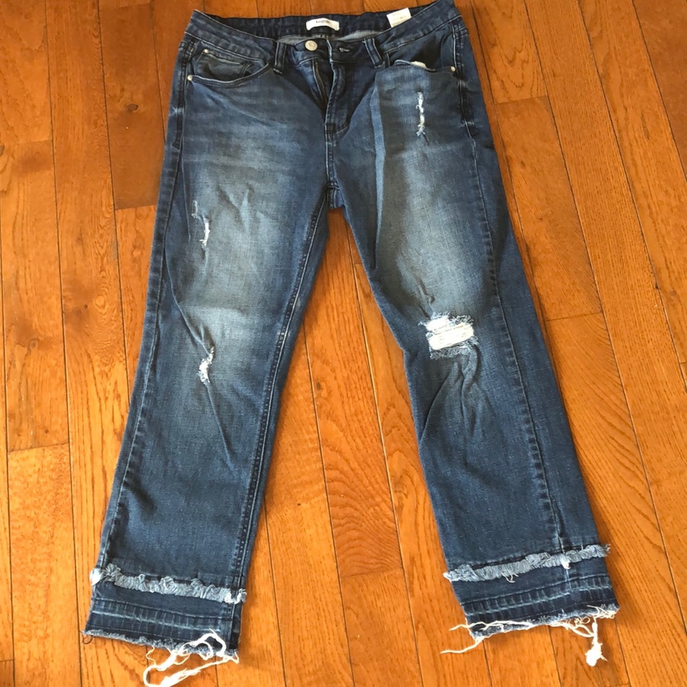 Distressed boot cut jeans